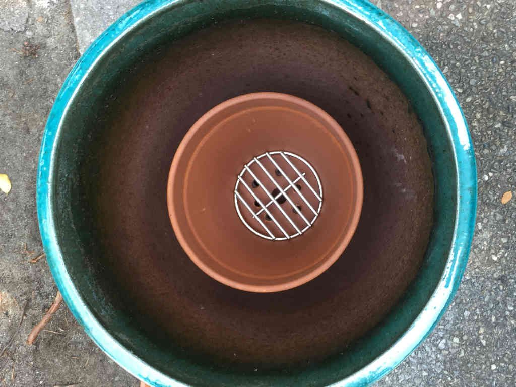 Grate for a Tandoor pot