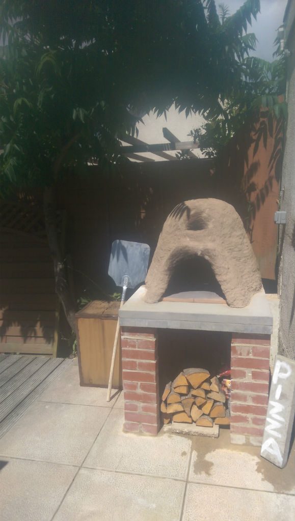 Pizza oven built around a terracotta pot built by Daniel Chant