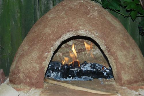 First fire of clay oven